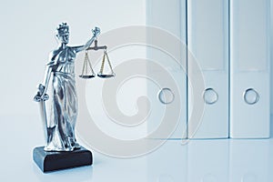 Lady Justice statue in law firm office