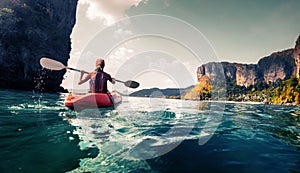 Lady with kayak photo