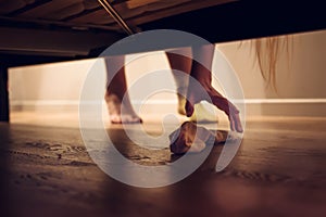 Lady looking for a second sock