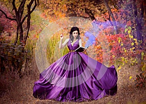 Lady in a luxury lush purple dress