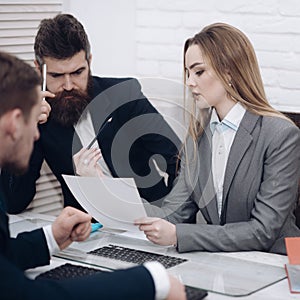 Lady manager tries to organize working process with colleagues in office. Business colleagues at meeting, office