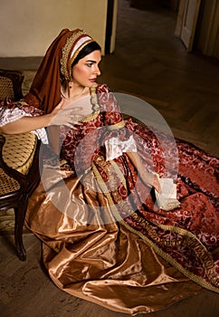 Lady in medieval dress and letter