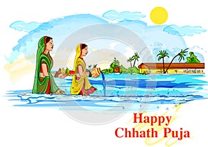 Lady offering Chhath Pooja to Sun God in traditional festival of Bihar, India