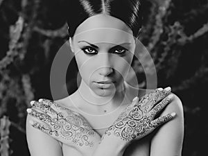 Lady with painted hands mehendi