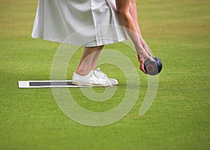 Lady Playing Lawn Bowls