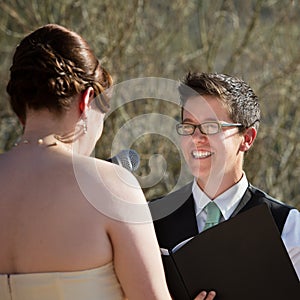 Lady Reading Vows to Bride