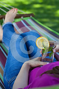 Lady resting on hammock