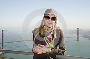 Lady in San Francisco with Golden Gate Brid photo