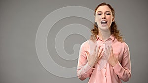 Lady saying inspiration in sign language, teacher showing words in asl tutorial