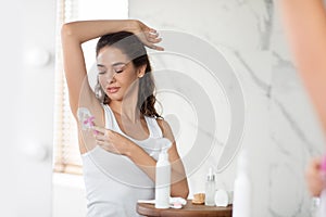 Lady Shaving Armpits With Safety Razor Removing Hair In Bathroom