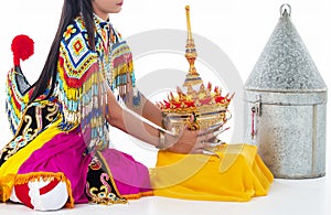 The lady in Southern thai classical dancing suit is touchingthe headdress ,prepare for put on her head