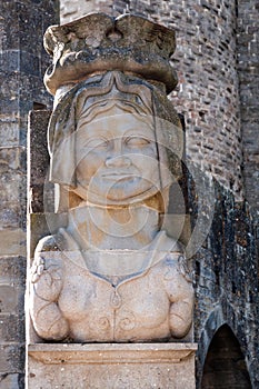 Lady statue on the entrance of Porte Narbonnaise at Carcassonn
