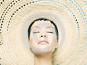 Lady in straw hat