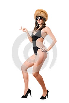 lady in sunglasses wearing swimsuit and fur-cap