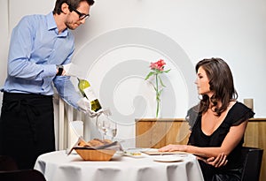 Lady and waiter in restaurant