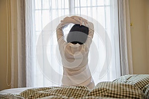 Lady wake up stretch oneself lazily for fresh morning