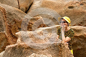 Lady Wearing a Yellow Outfit at the Beach