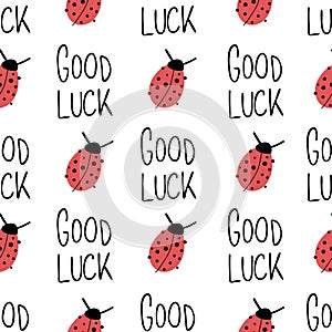 Ladybug and Good luck hand drawn lettering on white seamless vector pattern. Cute ladybug, Good Luck quote repeating