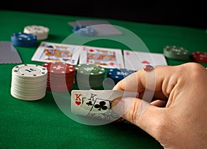 Ladybug on hand during a poker game