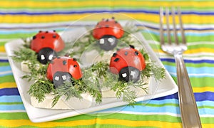 Ladybug tomato and olive with cheese