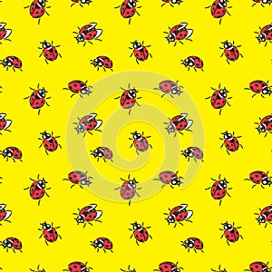 Ladybugs vector seamless pattern on yellow background