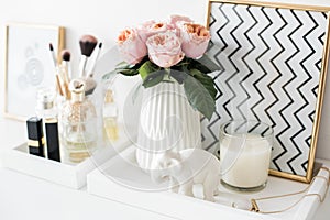 Ladys dressing table decoration with flowers, beautiful details,