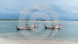 Laem Son National Park, Ranong, Thailand - November 2021 : Pier in National park with local fishing boats
