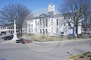 Lafayette County Court House in center of historic old southern town and storefronts of Oxford, MS