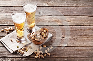Lager beer glasses and snacks