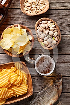 Lager beer mug and snacks