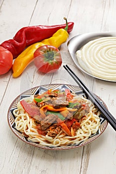 Laghman, hand pulled noodles dish with lamb meat and vegetables