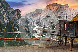 Lago di Braies lake and Seekofel peak at sunrise, Dolomites. Italy photo