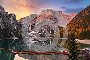 Lago di Braies lake and Seekofel peak at sunrise, Dolomites. Italy photo