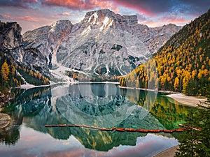 Lago di Braies lake and Seekofel peak at sunrise, Dolomites. Italy