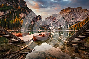 Lago di Braies lake and Seekofel peak at sunrise, Dolomites. Italy