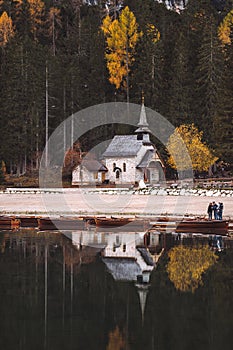 Lago di Braies Pragser Wildsee Drone autumn fall Italy Boats and reflection photo