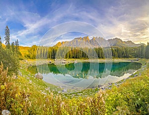 Lago di Carezza,Elevated at 1,519m, an alpine spectacle with emerald waters photo