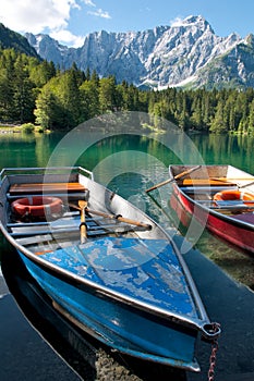 Lago di Fusine e monte Mangart with row boat photo