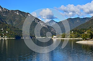 Lago di Ledro and its surrounding mountains. View from Molina on a clear autumn day. Trentino, Italy
