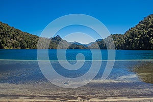 Lago Espejo Grande near Villa la Angostura in Neuquen Province, Argentina. Beautiful sunset on Lago Espejo Grande photo