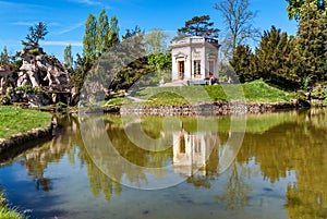 Lagoon with reflextion of a house in Versailles in Paris