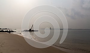 Lagos beaches; Oniru beach Victoria Island on a mid morning with harmattan haze and dust storm 