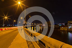 Ikoyi Lekki link suspension bridge Lagos Nigeria at night with view of the lagoon.