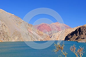 Laguna Agua Negra lagoon with andean mountains at the road to the Paso Agua De Negra, Elqui valley, Vicuna, Chile