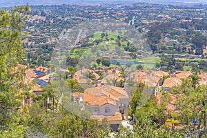 Laguna Niguel suburban community with trees and field in Southern California