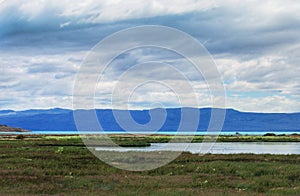 Laguna Nimez reserve before Lake Argentino and Andes Mountains, El Calafate, Argentina. photo