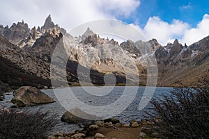 Laguna Toncek, rocks, and mountains in Refugio Frey, Bariloche, Argentina