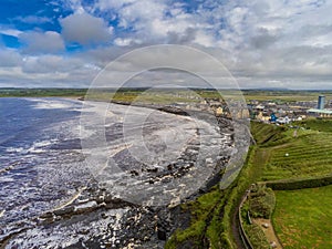 Lahinch, County Clare, Ireland - 08/07/2020: Aerila drone view on Lahinch town and beach, Popular surfing and tourist destination