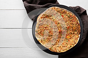 Lahmacun turkish homemade pizza with minced beef or lamb meat, paprika photo