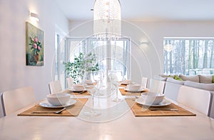 Laid table in dining room photo